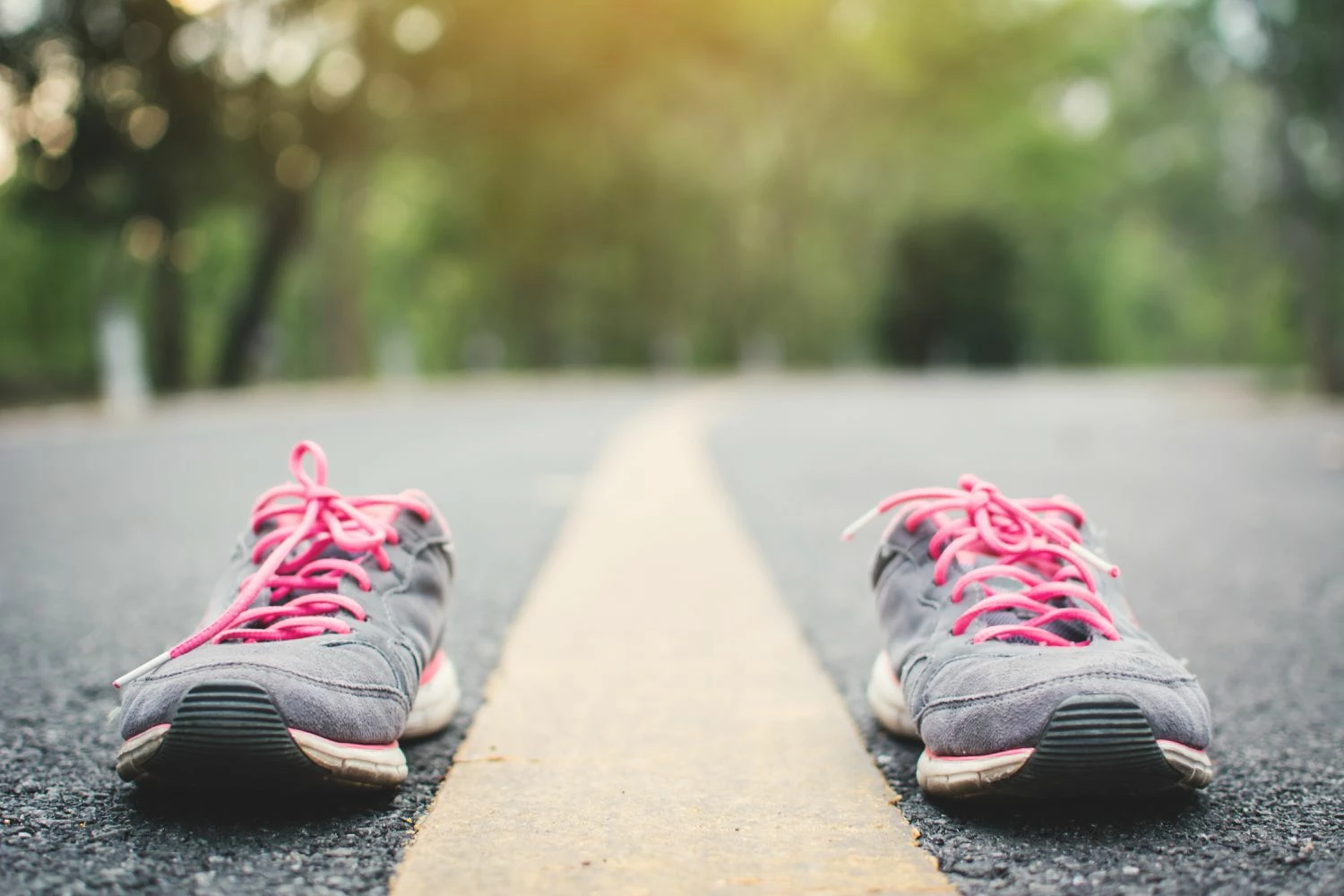 Shoes Sales Store -Shoes Sales Store close up of sports shoes on road 995443868 5c38b23746e0fb00016a48f0